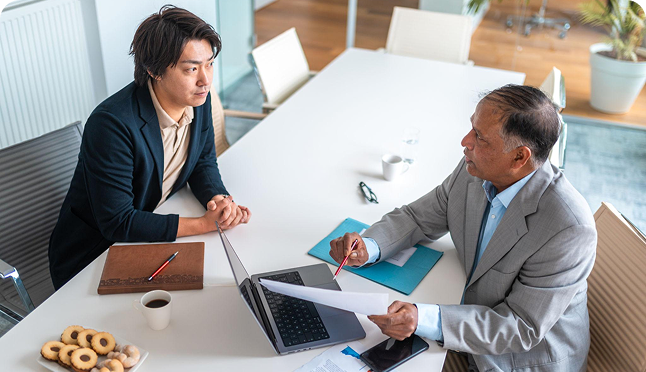 Raymoon team meeting in a modern office